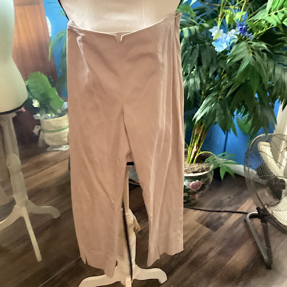 Beige capri pants with side zipper.  Size 4